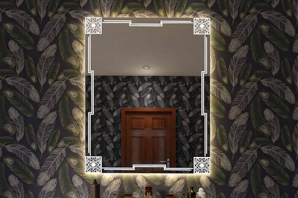Etch Mirror with back light from Grand Mirrors installed against a decorative wall